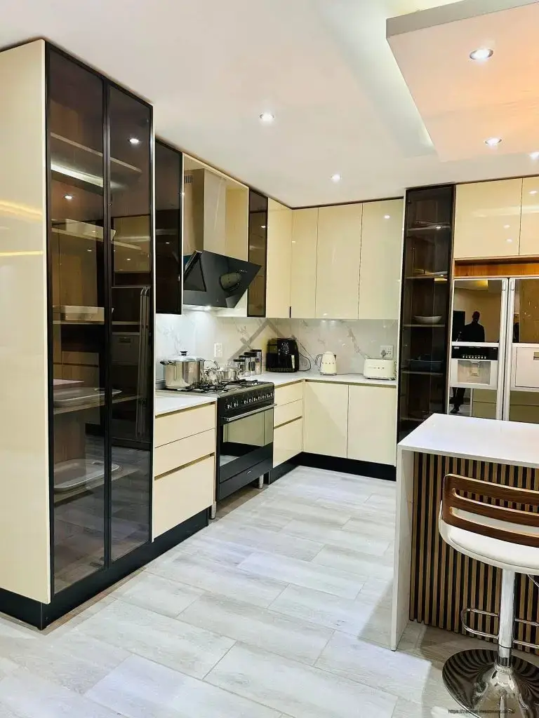 kitchen built-in cupboards with black aluminium glass doors